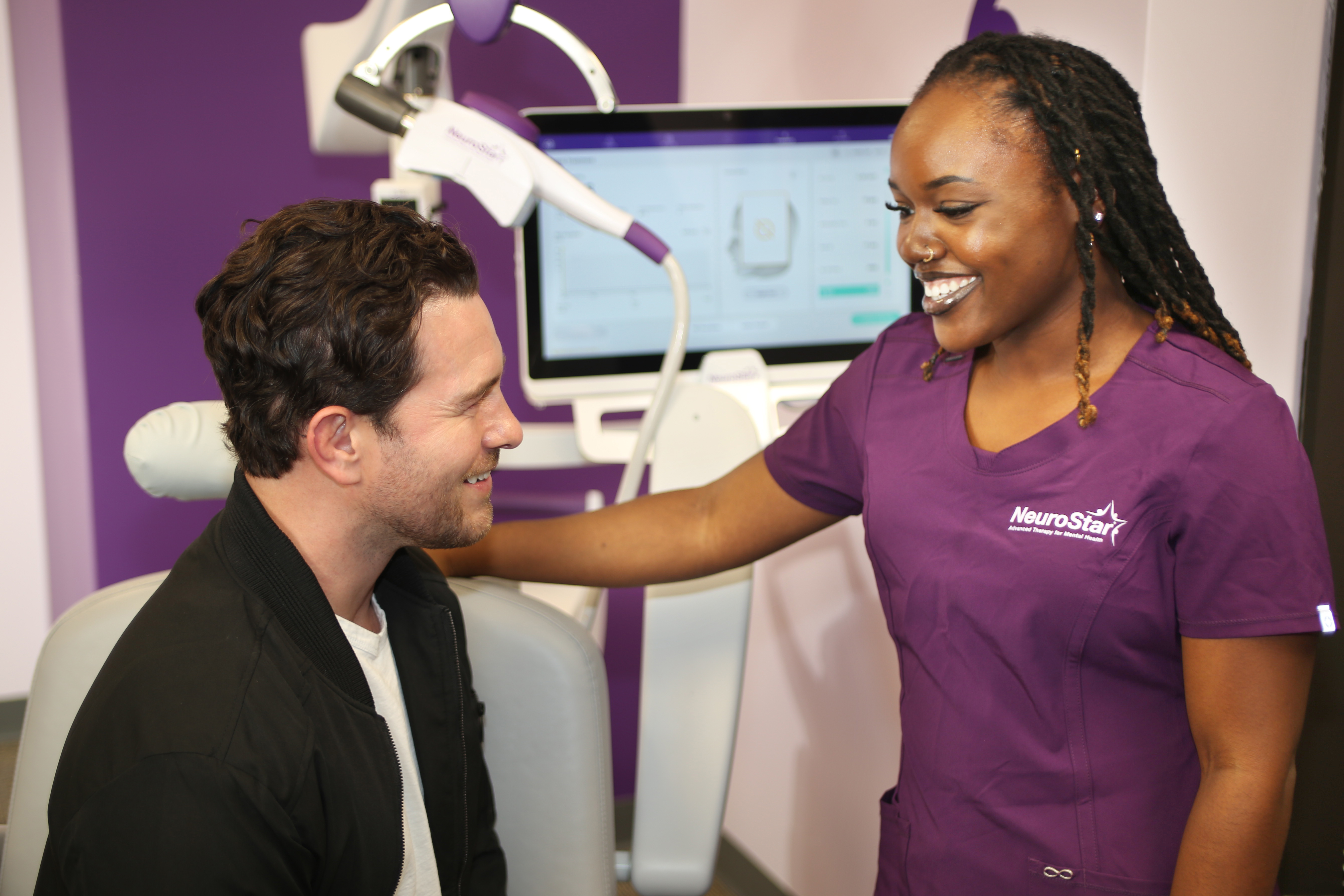 Male patient consulting with NeuroStar TMS provider about motivation energy depression Palm Beach County Boca Raton